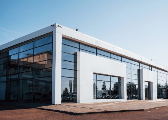 modern-car-building-many-vehicles-inside-sunny-d-2023-11-27-04-58-06-utcResized.jpg